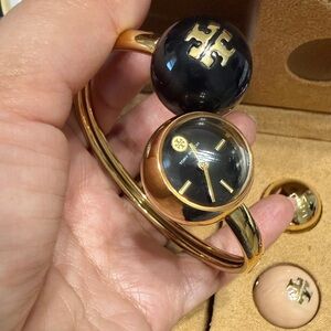 Tory Burch Black and Gold Logo Sphere Bangle Watch